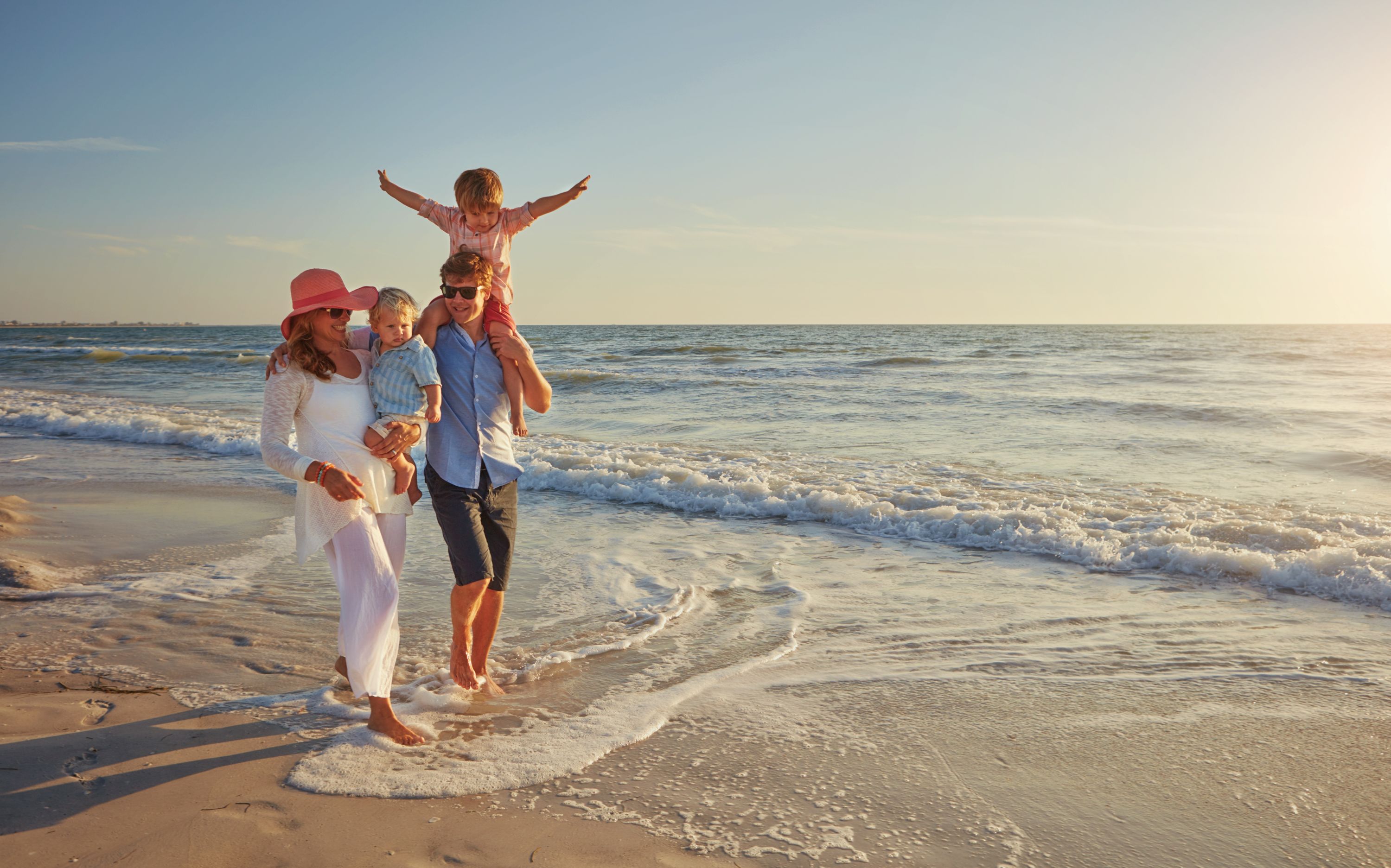 Beach Family Shutterstock 2472674503